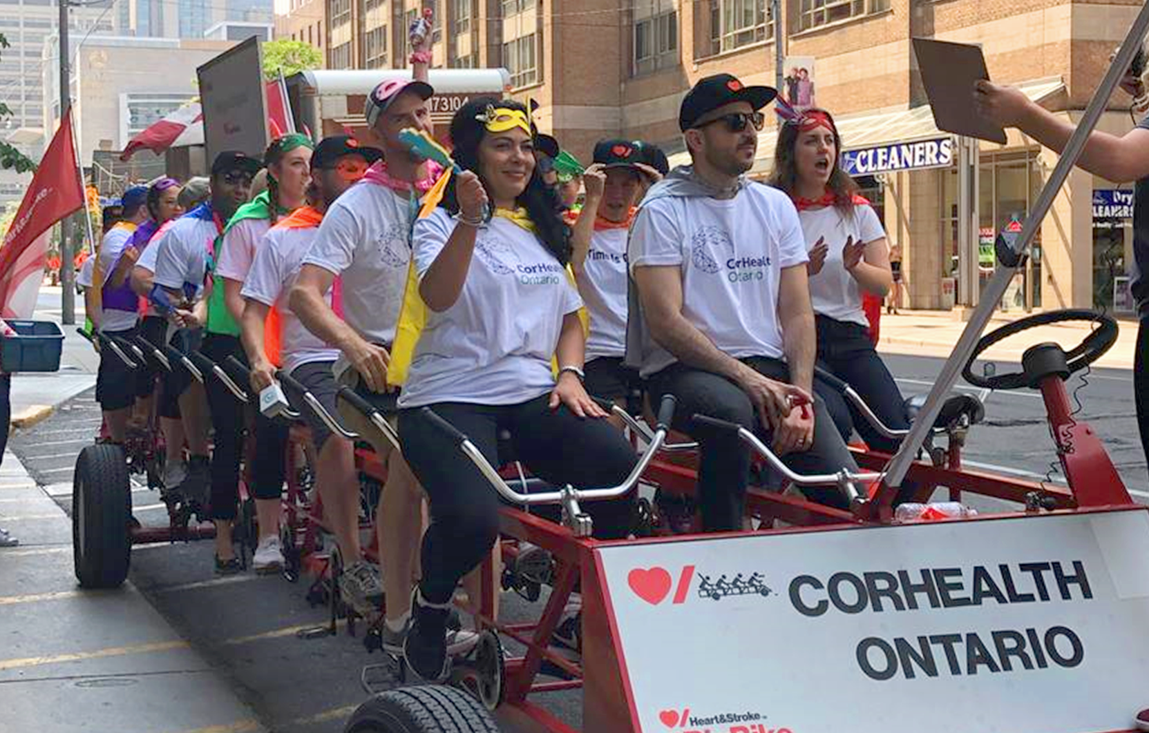 CorHealth team riding the Heart and Stroke Foundation's Big Bike.